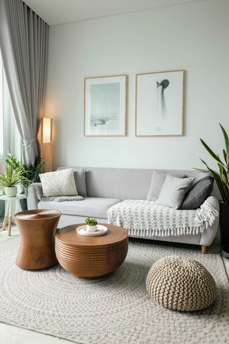 Bright living room with sunlight and cozy furniture, symbolizing an organized home.